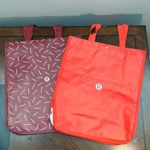 Red and maroon lululemon bags